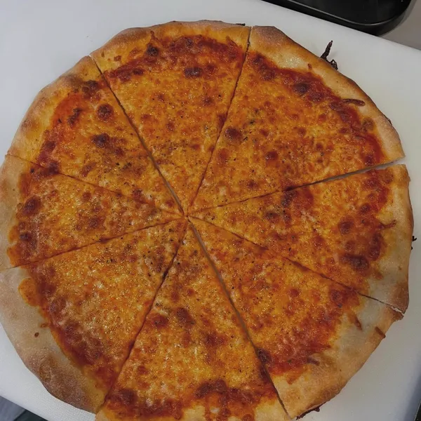 Classic cheese pizza sliced into eight pieces